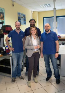 Barbara Gallo in the middle, with her husband Massimiliano Gamerro behind. On the left in the photo Alessio Canil, production department management. On the right Davide Biglia, metrology manager