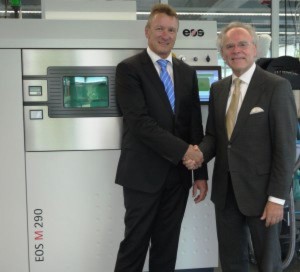 Pascal Boillat (left), Head of GF Machining Solutions with Dr. Hans J. Langer (right), Founder and CEO EOS Group in front of an EOS M 290 metal Additive Manufacturing system
