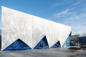 The blue facade of the Europe Building was 3D printed from a sustainable bioplastic developed by Henkel